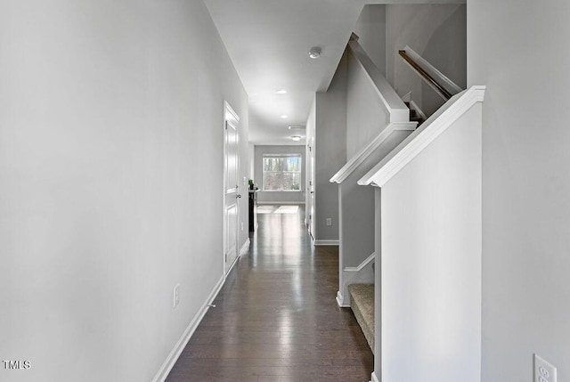 hall with dark wood-type flooring