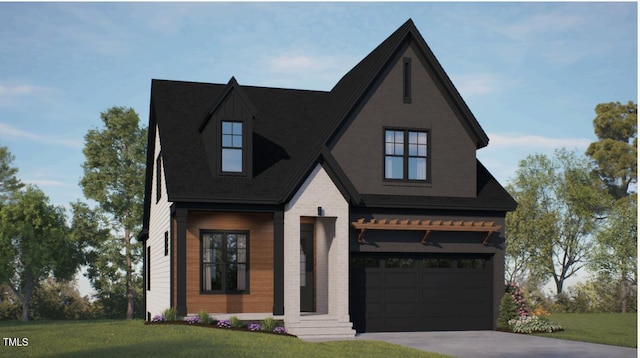 view of front of house with a front yard and a garage