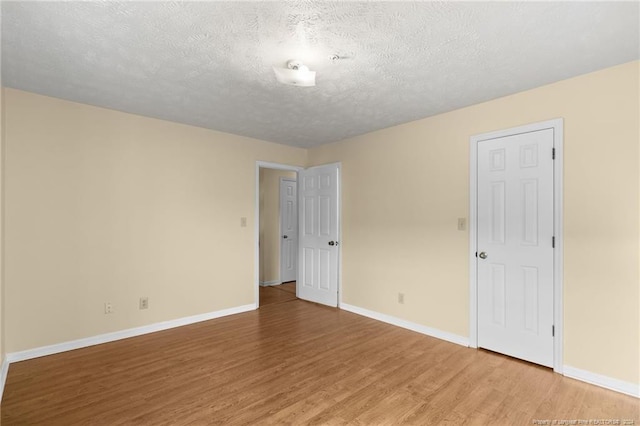 209 Waterdown Dr Unit 6, Fayetteville, NC 28314 - spare room with light wood finished floors and a textured ceiling