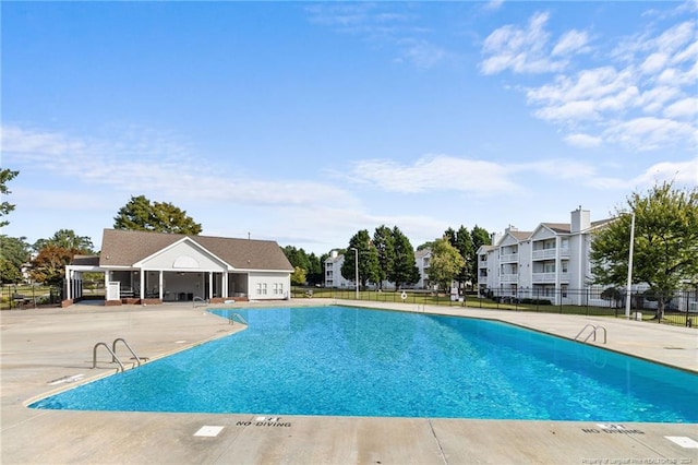 view of pool featuring a patio area