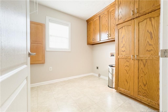 laundry area featuring cabinets, washer hookup, and hookup for an electric dryer