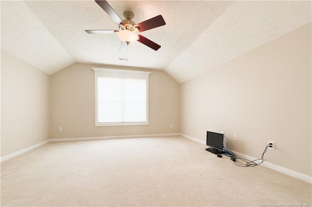 bonus room with carpet and lofted ceiling