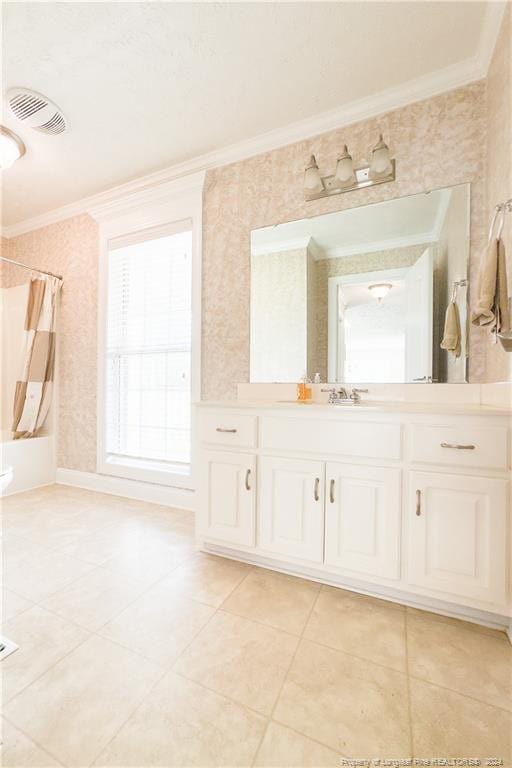 bathroom with tile patterned floors, shower / tub combo with curtain, vanity, and ornamental molding