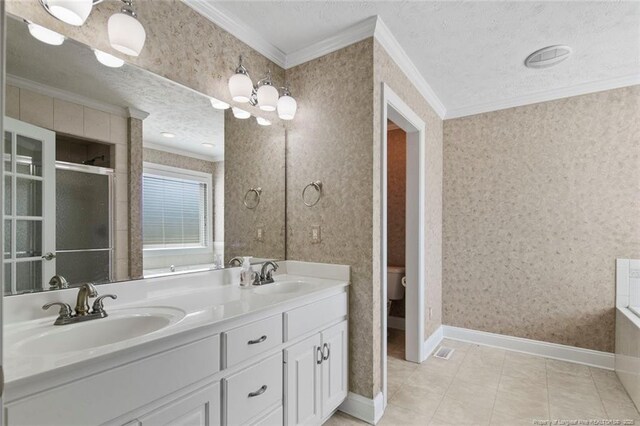4419 Cameron Rd, Hope Mills, NC 28348 - bathroom featuring crown molding, wallpapered walls, double vanity, an enclosed shower, and a chandelier