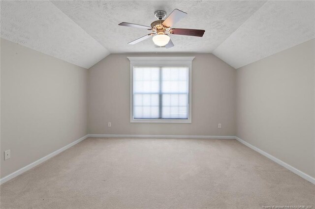 4419 Cameron Rd, Hope Mills, NC 28348 - bonus room featuring lofted ceiling, a textured ceiling, carpet, and ceiling fan