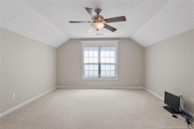4419 Cameron Rd, Hope Mills, NC 28348 - bonus room with carpet floors, vaulted ceiling, ceiling fan, and a textured ceiling