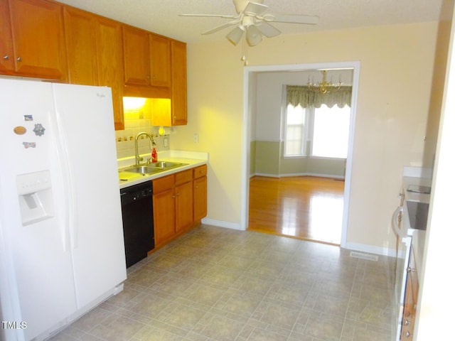 kitchen with dishwasher, sink, ceiling fan, decorative backsplash, and white fridge with ice dispenser