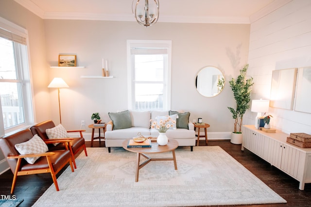 living room with crown molding, a healthy amount of sunlight, and dark hardwood / wood-style floors