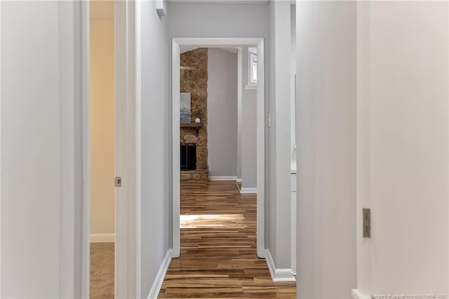 hallway featuring hardwood / wood-style flooring