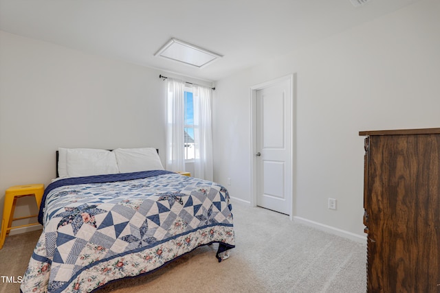 bedroom with light colored carpet