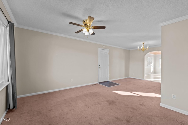 carpeted empty room with a textured ceiling, ceiling fan with notable chandelier, and ornamental molding