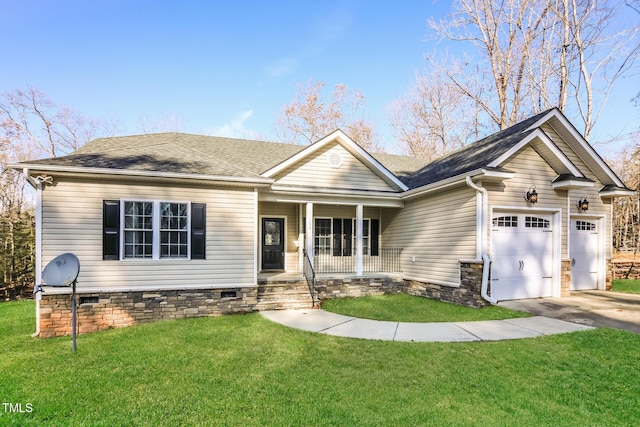 view of front of house with a porch, a garage, and a front yard