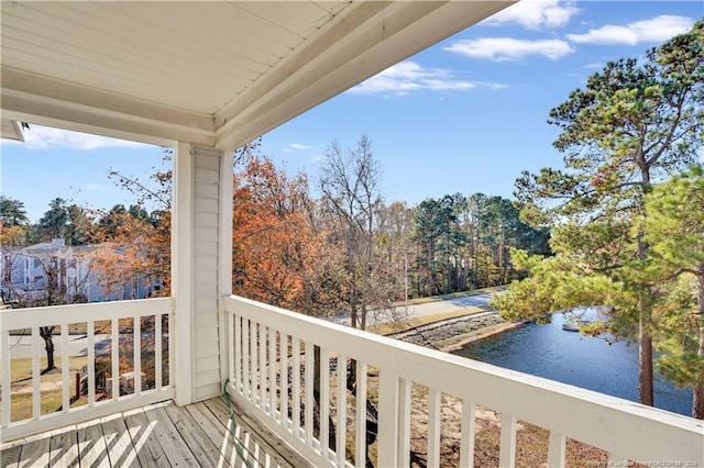 balcony featuring a water view