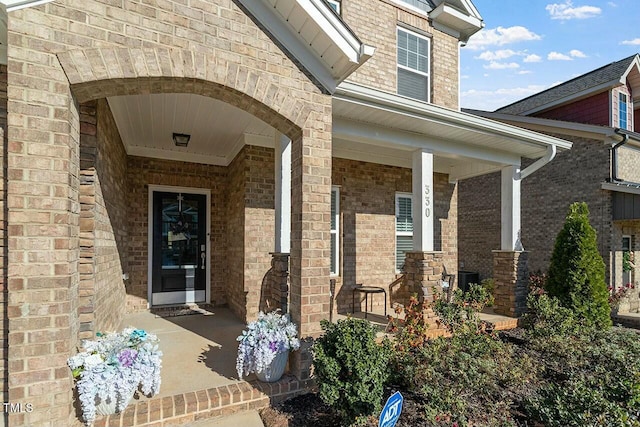 doorway to property with a porch