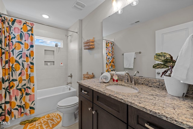 full bathroom with vanity, toilet, and shower / bath combo with shower curtain