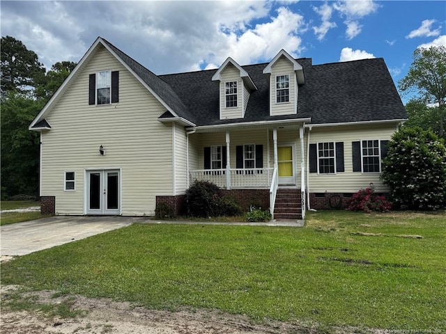 1597 Sand Hill Rd, Hope Mills, NC 28348 - cape cod-style house featuring a porch, a shingled roof, a front lawn, and french doors