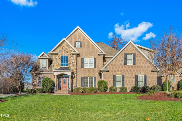 view of front of home featuring a front lawn