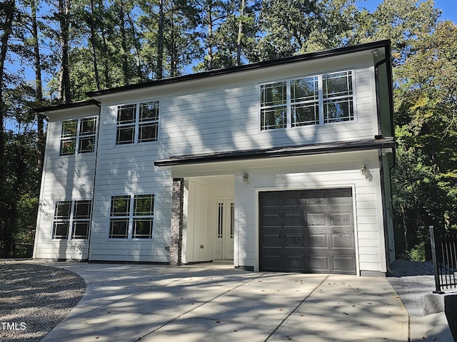 view of front of home with a garage