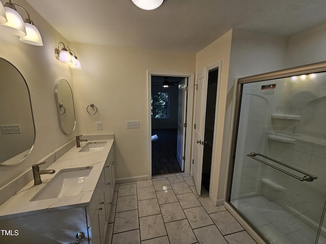 bathroom with vanity and walk in shower