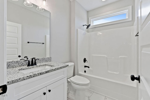 full bathroom with washtub / shower combination, vanity, and toilet