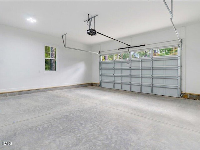 garage featuring a garage door opener