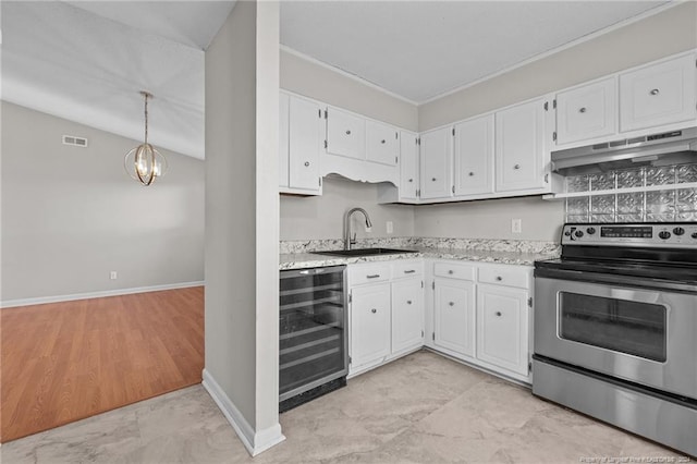 5814 Valhalla Ct, Fayetteville, NC 28304 - kitchen featuring stainless steel electric stove, beverage cooler, a sink, under cabinet range hood, and white cabinets