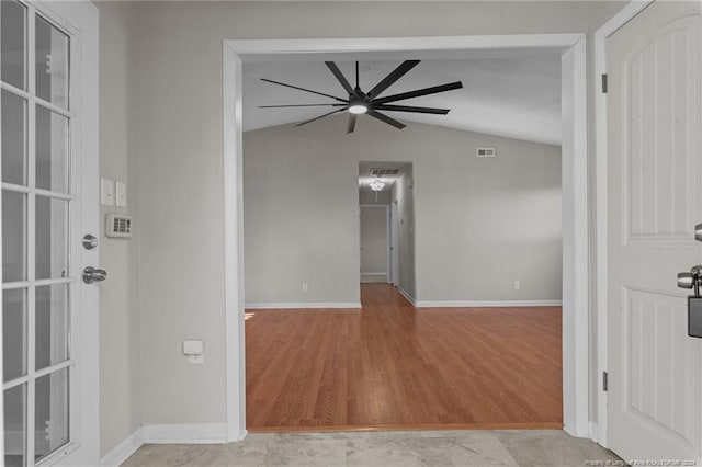 5814 Valhalla Ct, Fayetteville, NC 28304 - empty room featuring ceiling fan, vaulted ceiling, wood finished floors, and baseboards