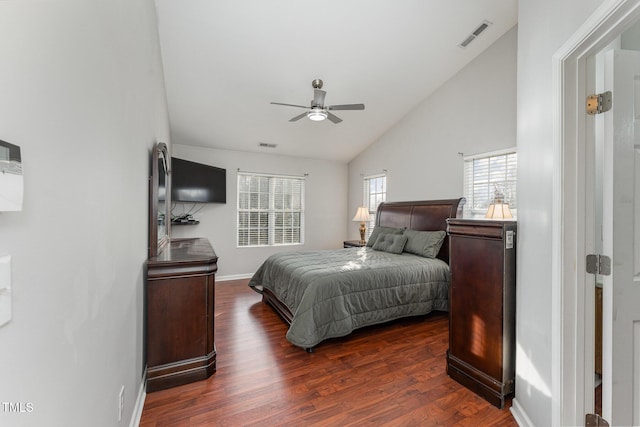 bedroom featuring ceiling fan, dark hardwood / wood-style flooring, and high vaulted ceiling