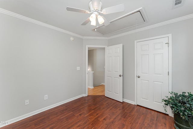 unfurnished bedroom with ceiling fan, crown molding, and dark wood-type flooring