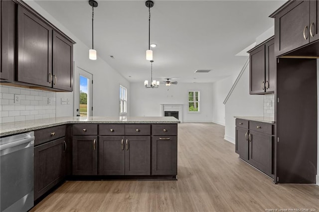 kitchen with light wood-type flooring, dark brown cabinets, dishwasher, and decorative backsplash