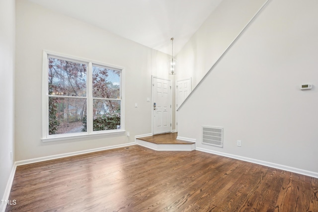 entrance foyer featuring hardwood / wood-style floors