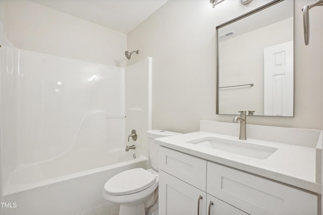 full bathroom featuring tile patterned flooring, vanity, toilet, and tub / shower combination