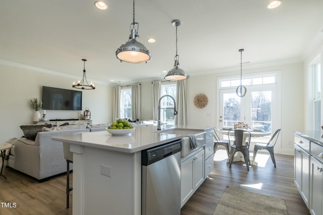 kitchen featuring dark wood-type flooring, a sink, light countertops, ornamental molding, and dishwasher