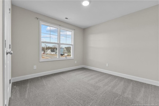 view of carpeted spare room