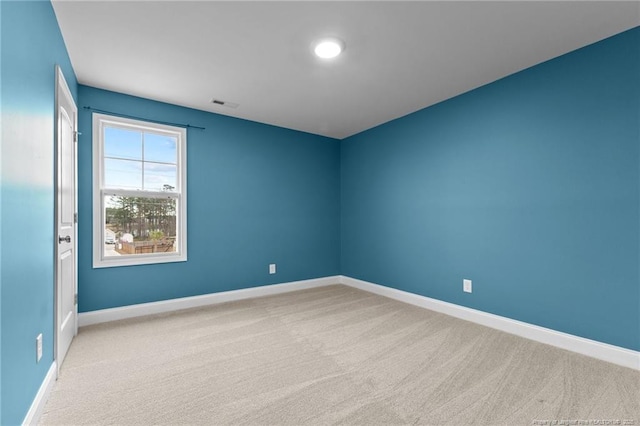 view of carpeted spare room