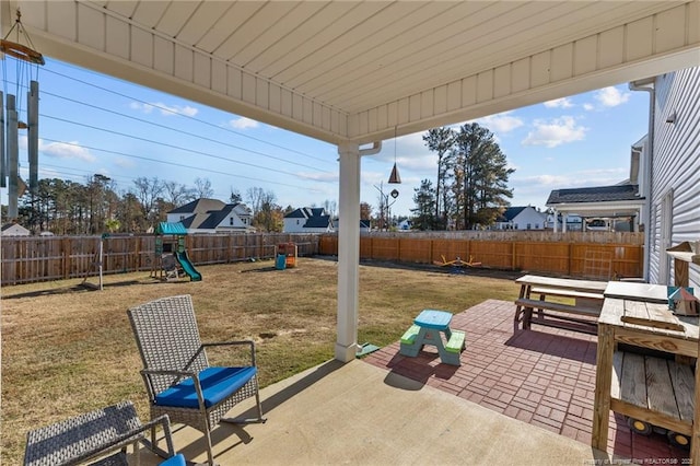 view of patio featuring a playground