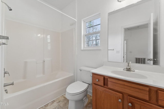 full bathroom featuring shower / tub combination, vanity, and toilet