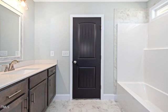 bathroom with vanity and shower / tub combination