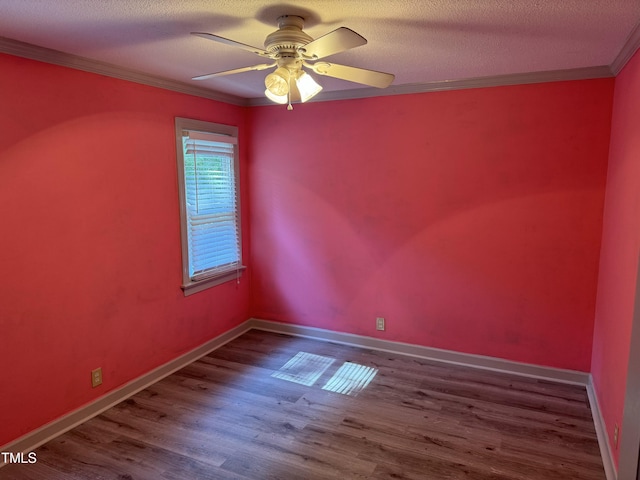 empty room featuring crown molding, ceiling fan, a textured ceiling, and hardwood / wood-style flooring