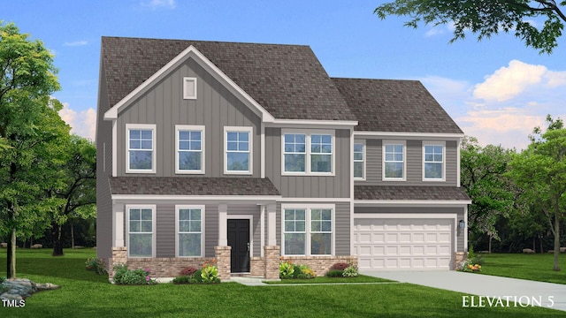 view of front of home with a garage and a front lawn