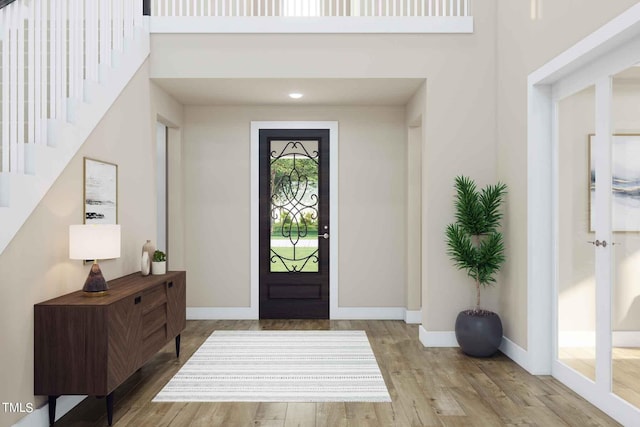1204 Holding Village Way, Wake Forest, NC 27587 - foyer entrance featuring wood finished floors and stairway