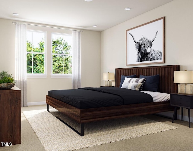 carpeted bedroom featuring recessed lighting and baseboards