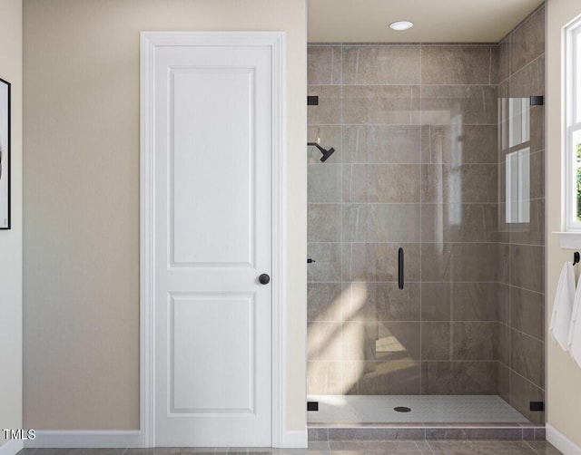 full bathroom featuring a stall shower