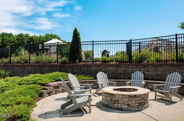 1204 Holding Village Way, Wake Forest, NC 27587 - view of patio / terrace featuring a fire pit