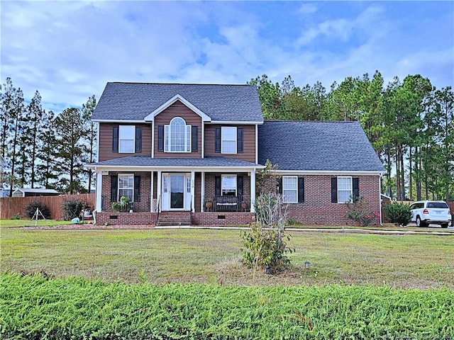 view of front facade featuring a porch and a front lawn