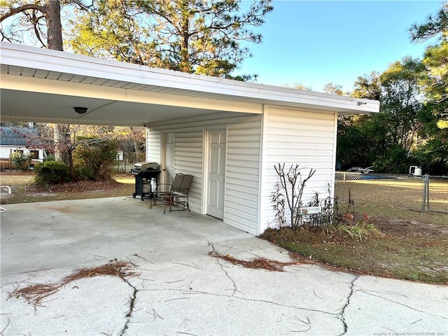 exterior space featuring a carport