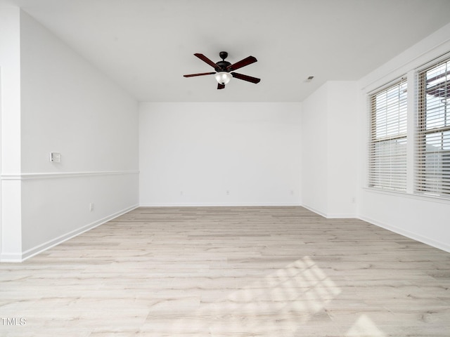 unfurnished room featuring light hardwood / wood-style floors and ceiling fan