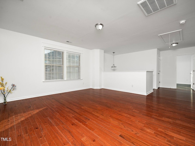 empty room featuring hardwood / wood-style floors