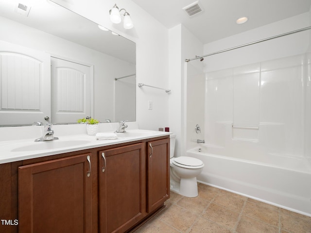 full bathroom with vanity, shower / bath combination, and toilet