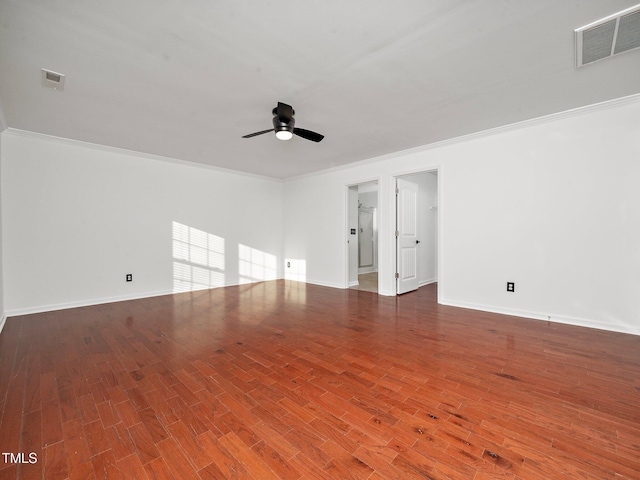 spare room with hardwood / wood-style flooring, ceiling fan, and crown molding